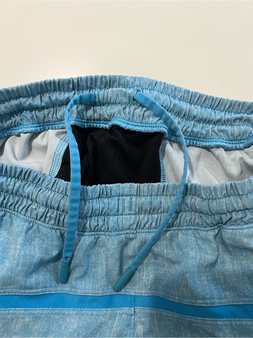 LULULEMON • men’s pace breaker shorts in baby blue